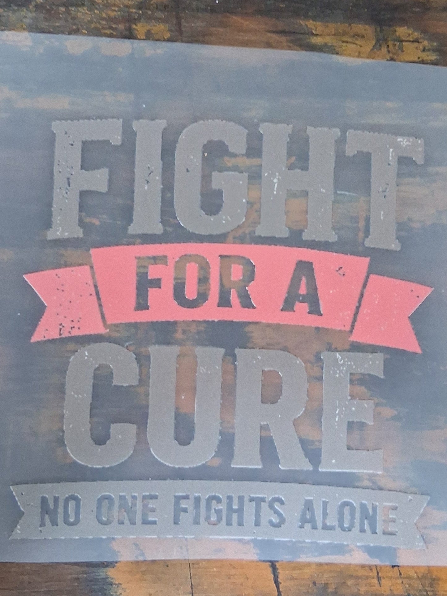 Breast Cancer DTF Transfer Bundle on a wooden surface