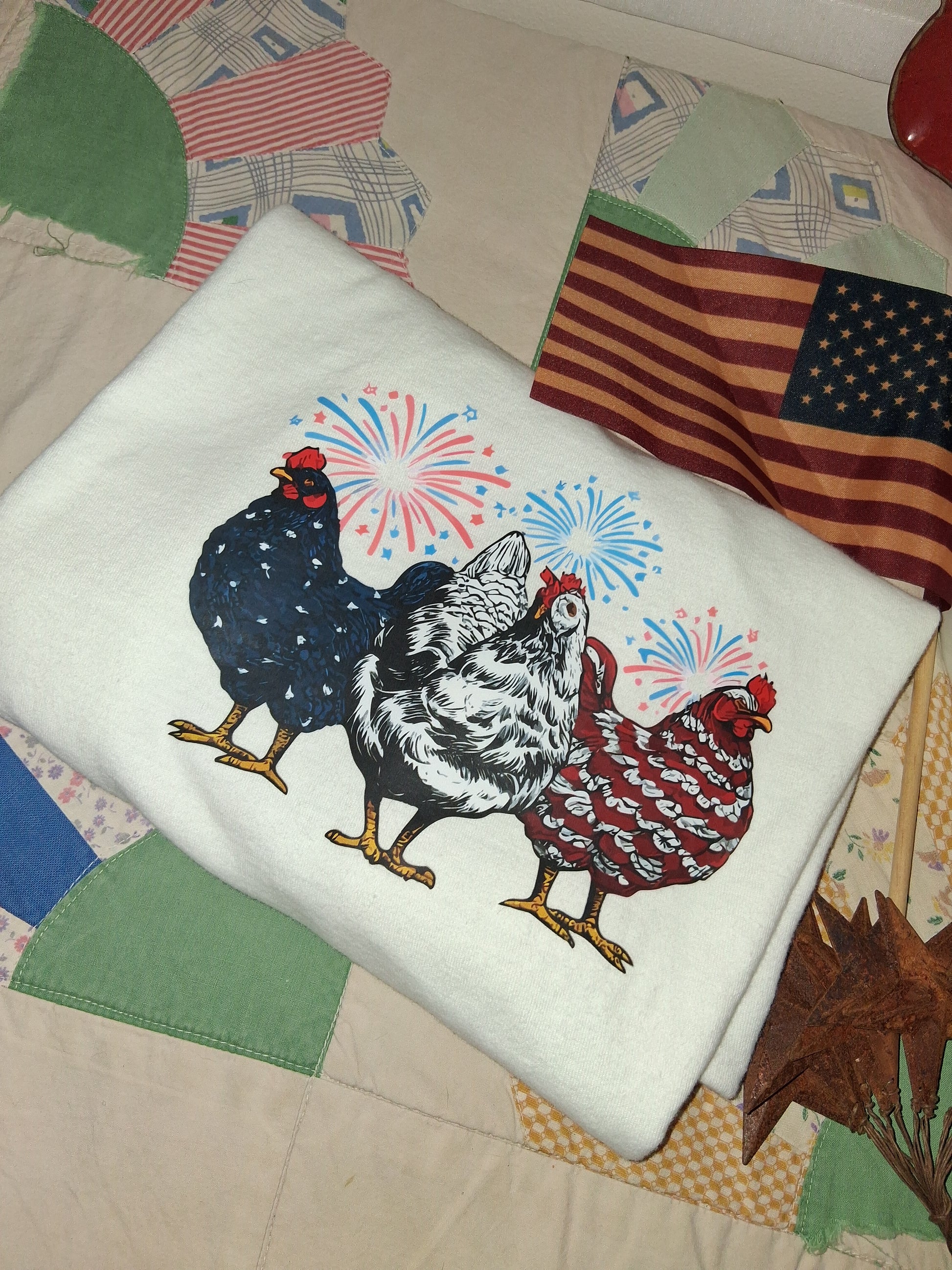 Patriotic Chicken Shirt | Farmhouse Americana Tee | Raw Hem Crop Top Large on a patchwork quilt
