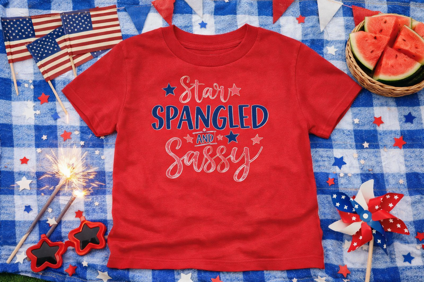 Red Star Spangled and Sassy Tee – Patriotic 4th of July Shirt on a blue checkered tablecloth with patriotic decorations.