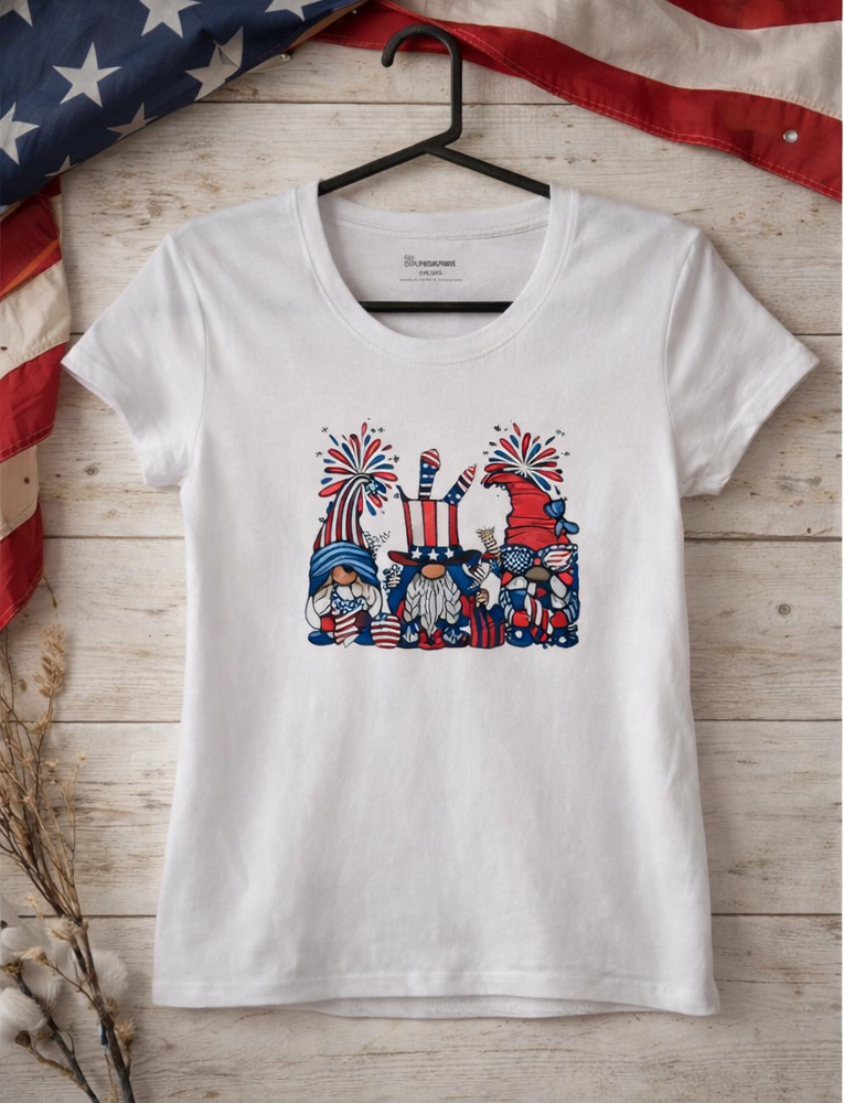 Patriotic Gnome DTF Heat Transfer Tee – 4th of July Graphic Shirt on wooden background with American flag